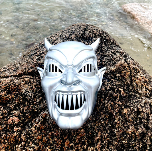 Demons wall mask and movie ticket