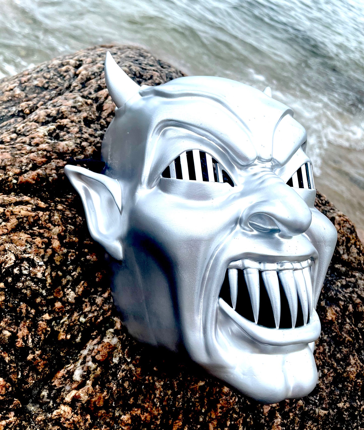 Demons wall mask and movie ticket