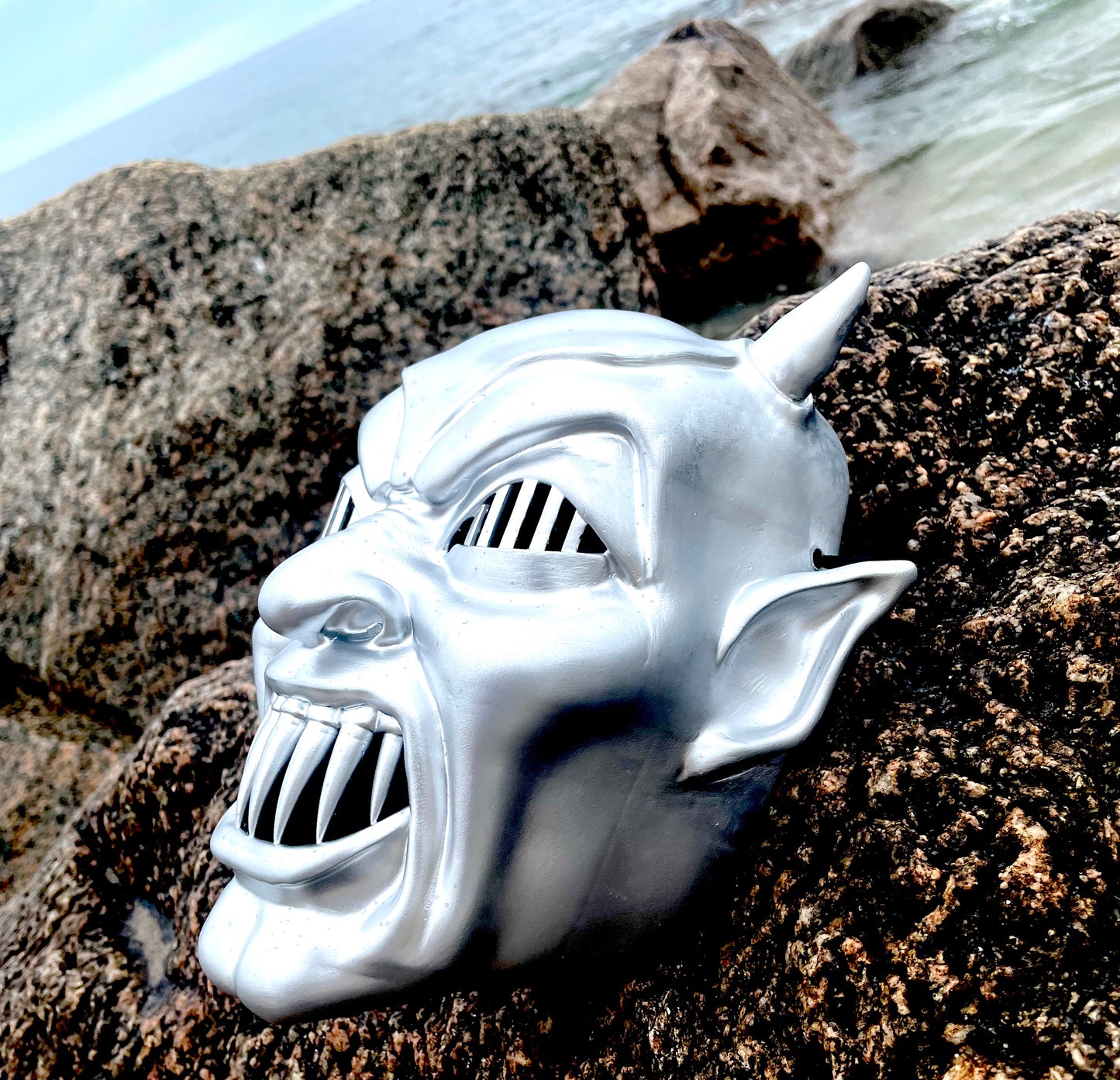 Demons wall mask and movie ticket